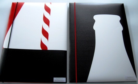 Recycled Adshel poster folders made from Coca-Cola's 100 year anniversary of the its countoured bottle